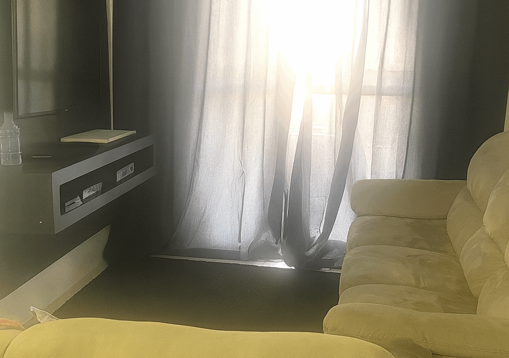 Sala iluminada e aconchegante